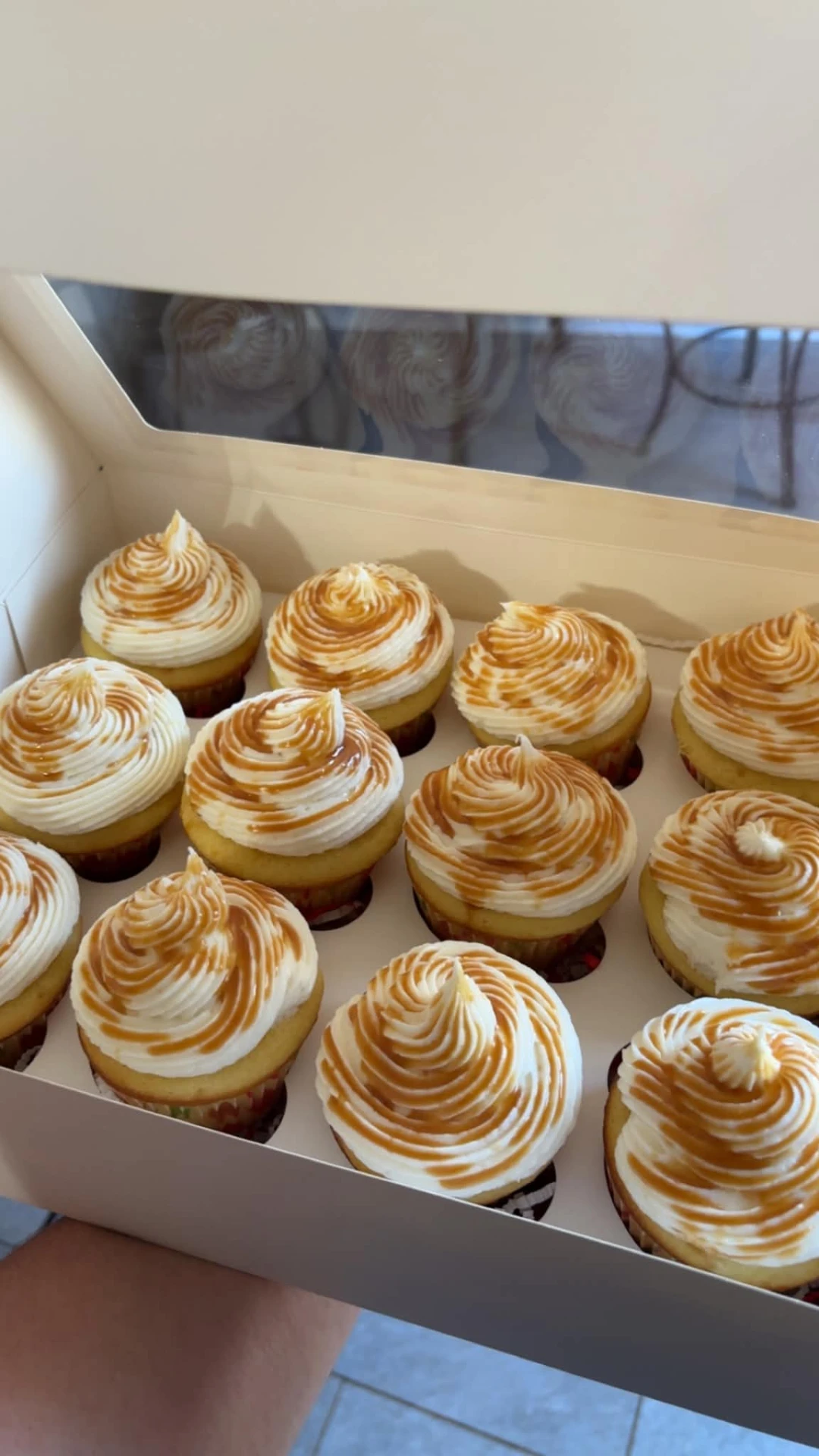Vanilla cupcakes with caramel drizzle